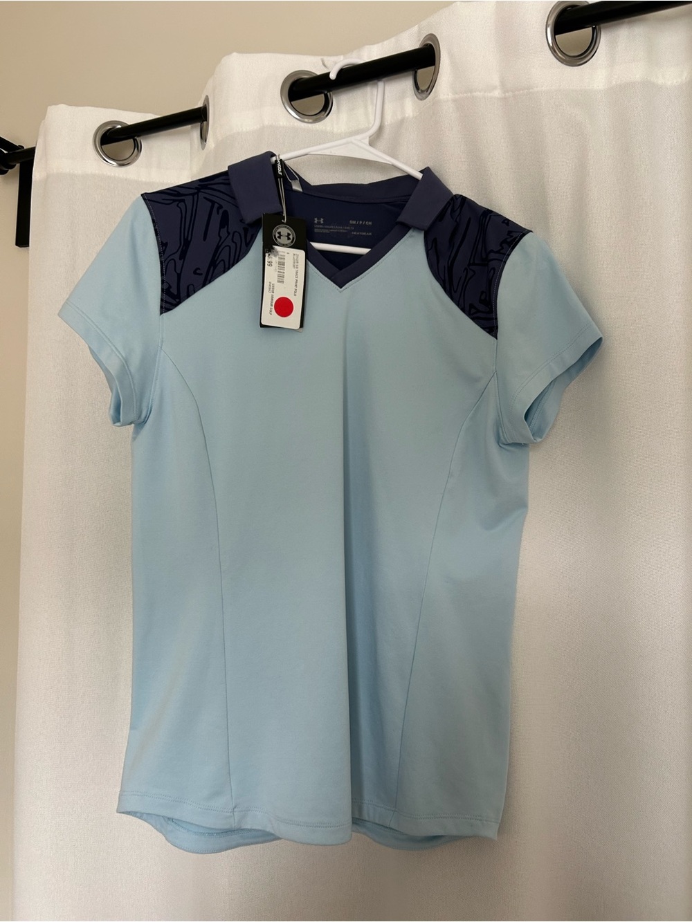Under Armour Light Blue V-Neck Short Sleeve Top with Navy Patterned Yoke